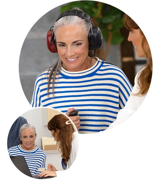 A person in a blue-and-white striped sweater undergoes a hearing test at a hearing clinic, wearing over-ear headphones while holding a device. An audiologist consults them nearby with a laptop.