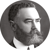 Le fondateur d’Oticon avec une barbe et une coupe de cheveux courte.