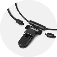 Clip de sécurité SafeLine noir avec cordon réglable et fermetures magnétiques.