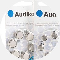 Hoorapparaatbatterijen in verpakkingen van Audika.